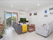 Sun Drenched Top Floor Apartment with Tandem Garage