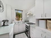 Sun Filled and Ideally Located 2 Bedroom In a Security...