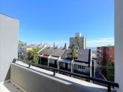 Sun filled living with Impressive Views Enter via Perry Lane