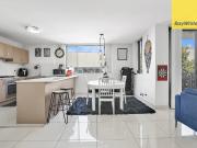 SUN FILLED MODERN TWO BEDROOM UNIT IN THE HEART OF...