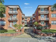 Sun washed easycare apartment steps from the shore