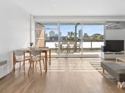 Sundrenched, oversized duplex apartment with cracking...