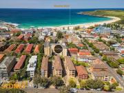 Sunlit Beachside Gem with Garage & North Facing Balcony