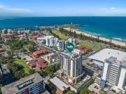 Sunlit corner apartment with views