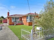 Sunlit Family Living with Space, Comfort & Potential