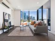 Sunlit Interiors with a Striking City Backdrop