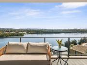 Sunlit Jewel Residence with Sweeping Waterfront Views