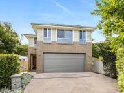 Sunlit Split Level Haven in a Prime Coastal Locale