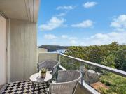 Sunlit top floor living with views over Berry's Bay...