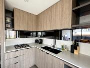 Sunlit Two Bedroom Apartment with Parking in the Heart...