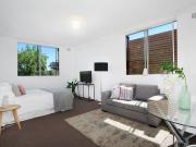 SUNNY STUDIO WITH SECURE PARKING & SHARED ROOFTOP