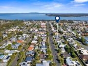 SUPERB LOCATION, LOW MAINTENANCE COASTAL LIVING!