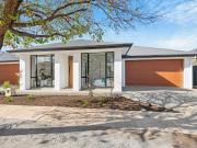 Superb single level new designer home with a double...
