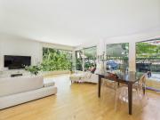 Duplex avec jardin privé, terrasses et double box...