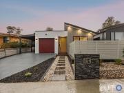 Superbly built, single level town residence