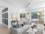 Superbly renovated ground floor poolside unit in the hub...