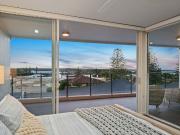 Sweeping panorama over CBD, harbour and hinterland
