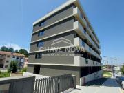 T0 Novo / prédio com lugar de garagem e piscina