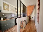 T3 EN DUPLEX DE 90 M2 FER A CHEVAL TRAMWAY