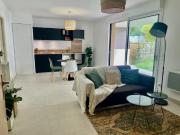 T3 en rez de jardin dans villa contemporaine