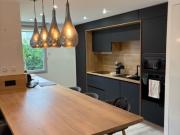 T3 meublé 70 m² en rez de jardin côté cour Terrasse...