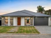 Take West Lakes in your stride with a home that lives as...