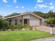 Tasteful Family Home Treated to Elevated Treetop Outlook
