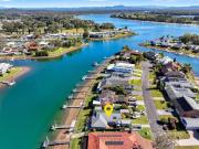 Tastefully Renovated Waterfront Duplex Captures...