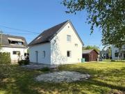 Teilsaniertes Einfamilienhaus mit großem Garten in...