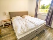 Temporary living where others go on vacation