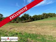Terrain à bâtir 1553 m² à 2 minutes du Bourg
