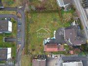 Terrain à bâtir avec immeuble et fort potentiel