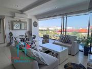 Terraza con vista a las albercas