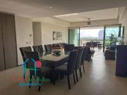 En condominio de playa. Terraza con vista a las albercas