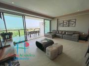 Terraza con vista a las albercas y áreas comunes