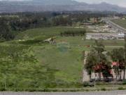 Terreno 7 hectareas via principal de tababela