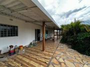 Terreno à venda de 690 m² com casa de 148 m² por R$...