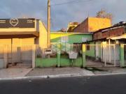Terreno com 2 casas Bairro Olaria