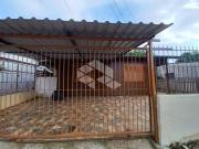 Terreno com 2 casas de madeira com 60,00m² de área...