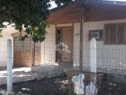 Terreno com 2 casas de madeira no bairro Moinhos de...