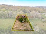 Terreno com construção