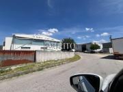 Terreno com pequeno armazém industrial