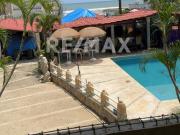 TERRENO CON CONSTRUCCION A PASOS DEL MAR EN LA BONFIL