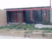 Terreno con construcción atrás de Universidad del caribe