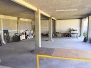 Terreno con construcción de usos múltiples en Tonalá