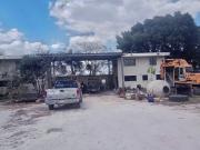 Terreno con construcción, sobre periférico