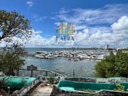 TERRENO CON CONTRUCCION CON FRENTE DE LAGUNA EN ZONA...