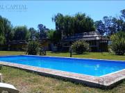 TERRENO CON QUINTA EN URIBELARREA