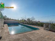 Terreno con vivienda y piscina