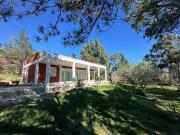 TERRENO DE 10.750M2 CON CASAS EN CORDON FORESTAL!